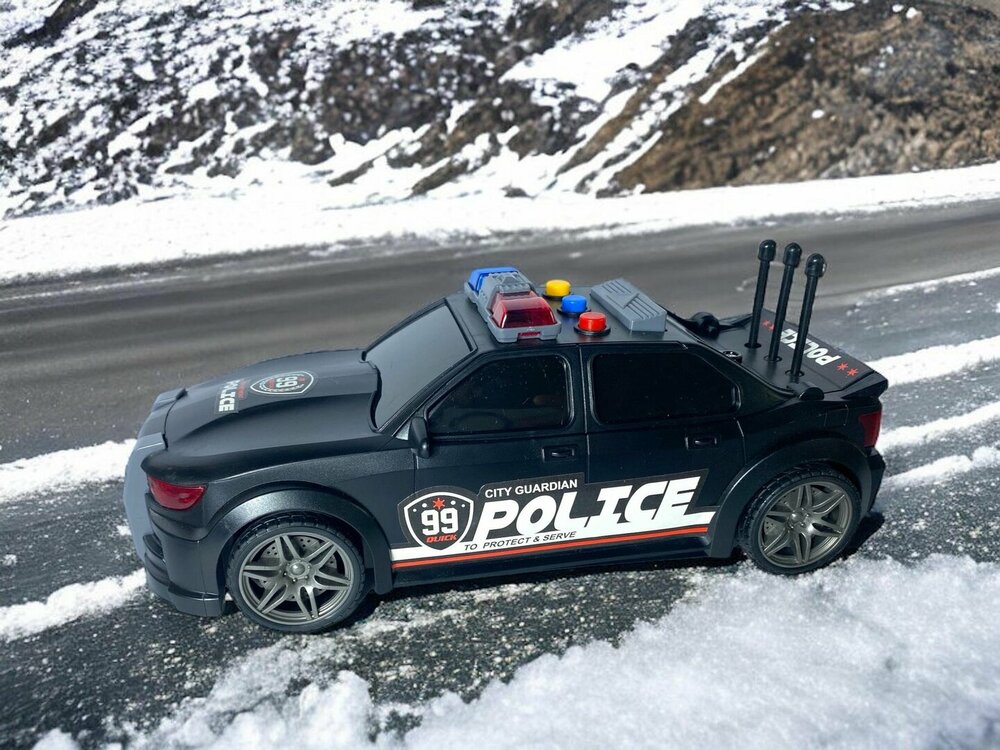 Police car 99 USA  - politie auto met frictiemotor - geluids- en lichteffecten - 1:16