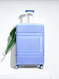 Large suitcase 65cm - up to 28kg - 4 spinner wheels light blue - 100% polypropylene - 2025 edition