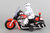Toy police motorcycle - with siren and light - friction powered