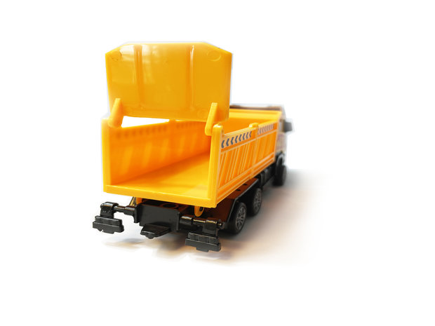Truck toy with flatbed tipper.